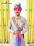 Elegant wedding groom sherwani in beige with intricate designs and colorful accessories