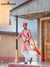Elegant wedding groom sherwani in peach with intricate embroidery and stylish accessories