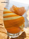 Elegant orange striped safa with intricate design, perfect for traditional occasions and celebrations