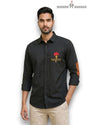 M Shirt in black cotton with Rajput logo on chest and elbow patches at a frontal angle