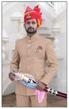 Men's Rajputi Jodhpuri Suit by Modern Marwar in beige with traditional accessories and a turban