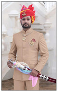 Men's Rajputi Jodhpuri Suit by Modern Marwar in beige with traditional accessories and a turban