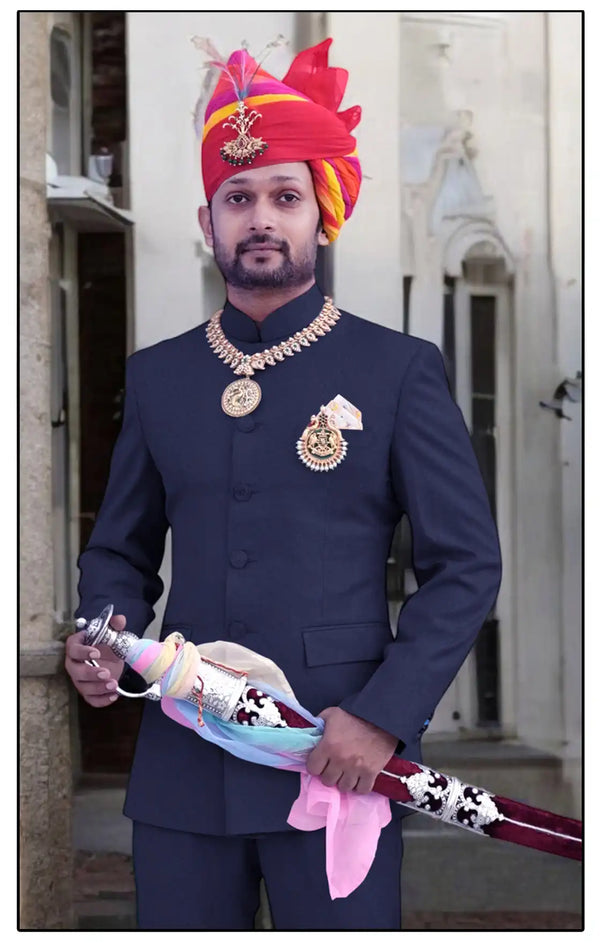 Elegant Rajputi Jodhpuri Suit for Men by Modern Marwar, featuring traditional design and regal accessories