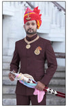 Elegant Rajputi Jodhpuri Suit for men in deep maroon with traditional accessories and a regal look