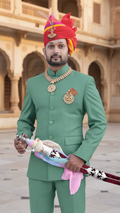 Elegant Rajputi Jodhpuri Suit for Men in Green with Traditional Accessories and Turban