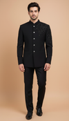 Elegant black royal bandhgala suit for men featuring intricate embroidery and classic buttons