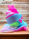 Colorful safa turban for weddings featuring vibrant pink and blue hues by Modern Marwar