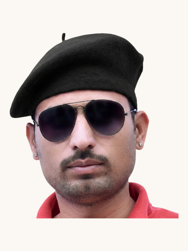 Default black wool beret cap online, worn at a slight angle by a man with sunglasses