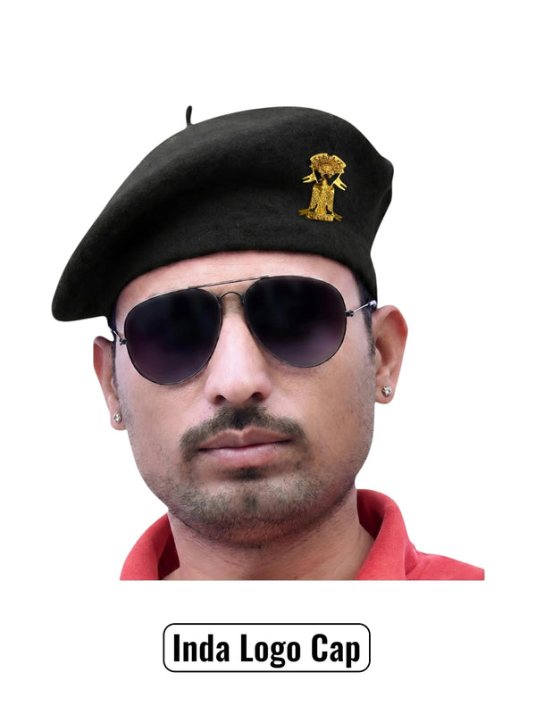 Black wool Inda Lobo & Beret Cap By Singh Brand worn at an angle on a model with sunglasses