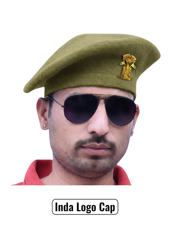 Default olive green wool beret cap worn at an angle featuring the Inda Lobo & Beret Cap By Singh Brand