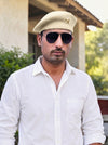 Default beige beret cap made of soft fabric worn by a man, featuring a star, Star Lobo & Beret Cap By Singh Brand