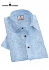 Singh men's light blue formal shirt with subtle leaf pattern and black buttons folded neatly