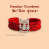 Sisodiya Chundawat moli bracelet in vibrant red with a decorative silver emblem