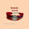 Solanki logo moli bracelet with colorful threads and a silver emblem for stylish accessory lovers