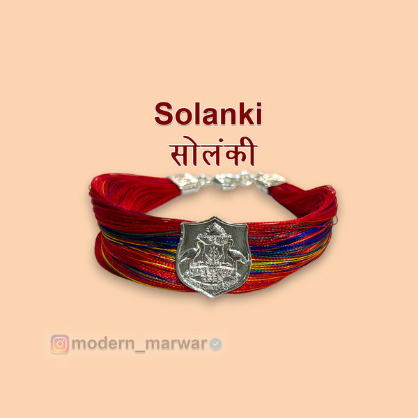 Solanki logo moli bracelet with colorful threads and a silver emblem for stylish accessory lovers