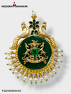 Elegant traditional brooch for men featuring intricate design with emerald and pearls