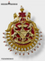Exquisite traditional brooch for men featuring intricate gold detailing and pearl accents