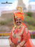 Traditional wedding sherwani outfit in orange with intricate designs, perfect for a festive celebration