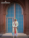 Elegant wedding groom sherwani in light green with traditional accents, perfect for ceremonial occasions