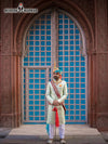 Elegant wedding groom sherwani in light green with traditional accents, perfect for ceremonial occasions