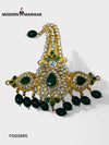 Elegant wedding maang tikka in gold with emerald and white stones, ideal for bridal fashion
