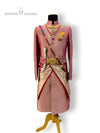 Elegant wedding sherwani for men in pink with intricate embroidery and ornate accessories